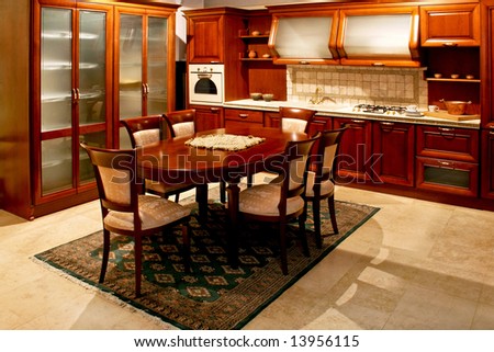 Classic style wooden kitchen with big table