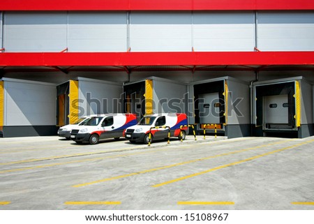 Loading delivery vans in front of cargo doors