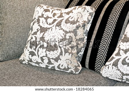 Modern soft pillow with floral on sofa