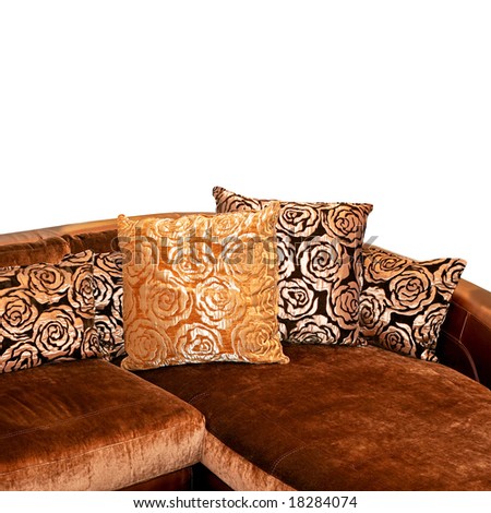 Golden sofa corner with pillows isolated on white