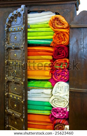 Oriental style locker with bunch of colorful textile
