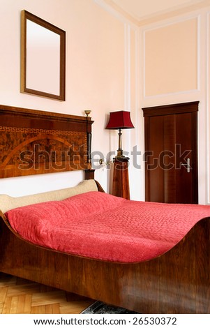 Interior shot of old bedroom with double bed