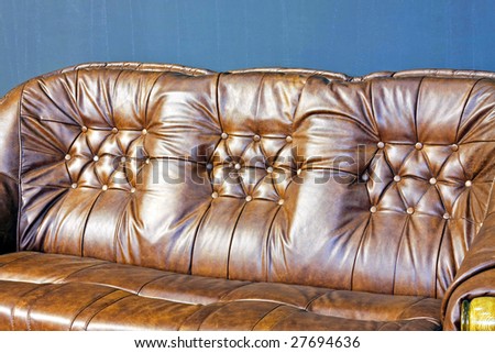 Brown leather upholster pattern at sofa backs