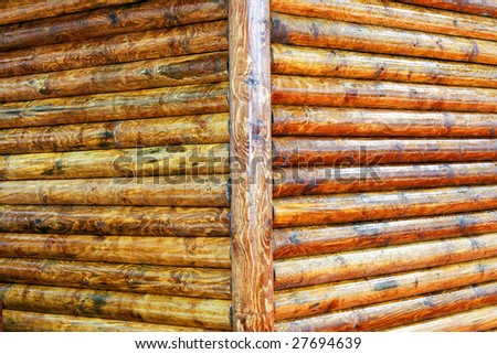 Brown log wood corner of cabin house