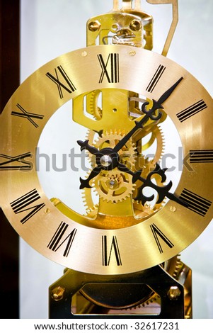 Close up shot of golden clock gears