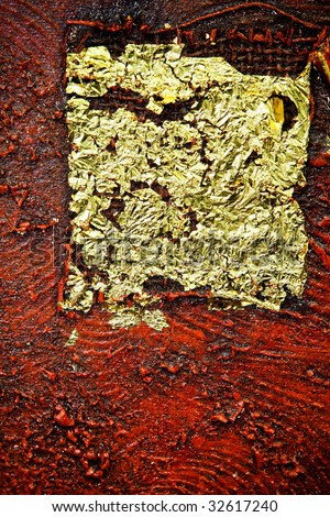 Close up shot of modern gold and red art