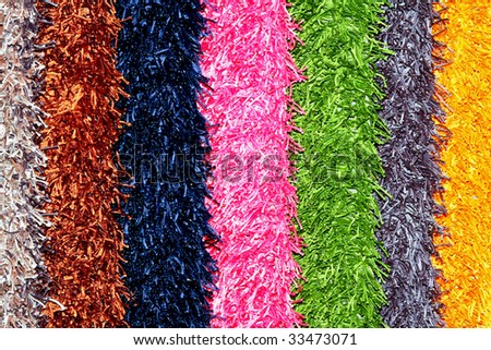 Color samples of shaggy wool carpet rolls
