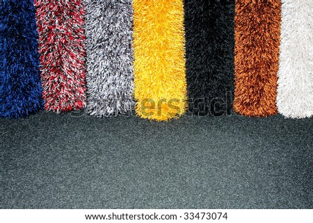 Color samples of shaggy wool carpet rolls