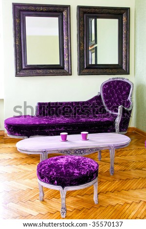 Living room with purple upholstered furniture set