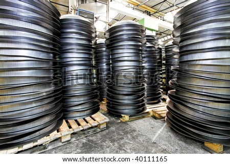 Piles of pan blanks in factory storehouse
