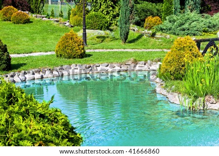 Small water pond in nice green park