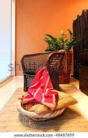 Interior of home terrace with rattan chair