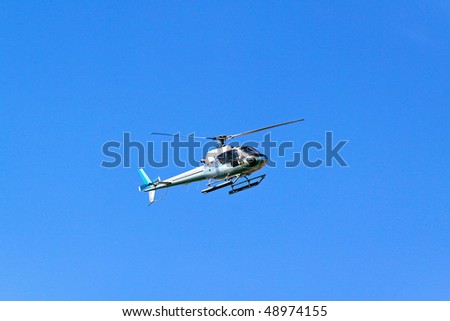 Close up shot of helicopter in the sky