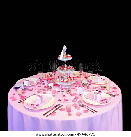Beautiful romantic wedding table setting with pink ornaments