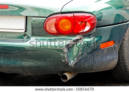 Close up shot of crashed car bumper