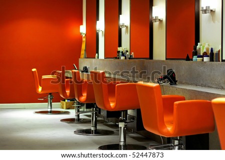 Modern empty hair saloon with chairs and mirrors Modern empty hair saloon with chairs and mirrors