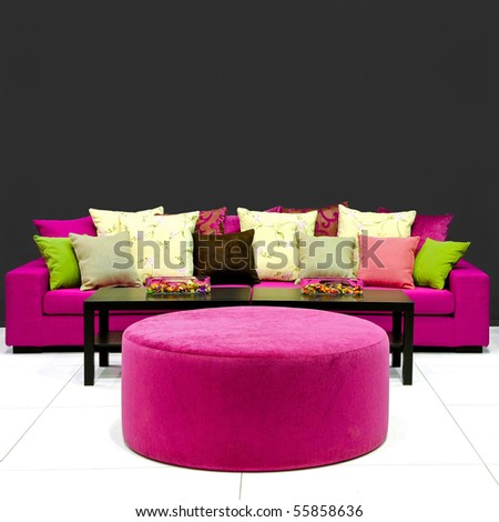 Colorful furniture with bunch of cushions on the sofa