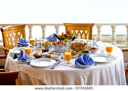 Elegant set up table with tasty food
