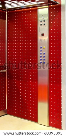 Interior shot of modern red elevator car