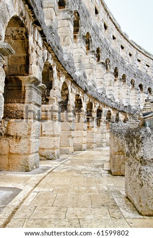 Stone corridor way inside of ancient Roman coliseum wall
