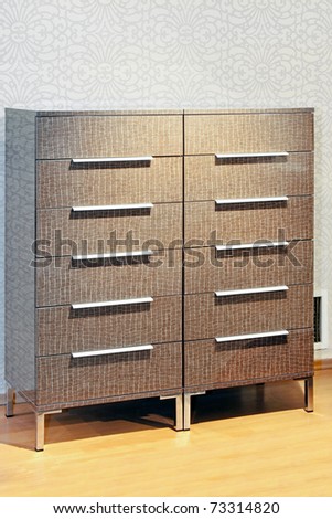 Modern cabinet with drawers in living room