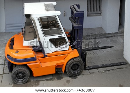 Industrial forklift commercial land vehicle in warehouse