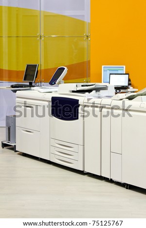 Big digital printer machinery in copy office