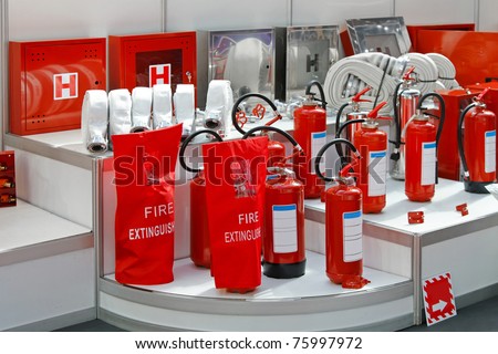 Fire hoses hydrants and extinguishers in red