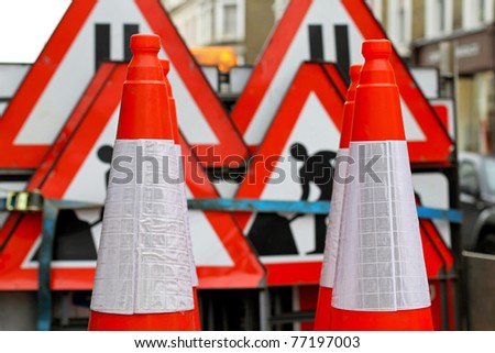 Road cones and traffic signs for construction safety
