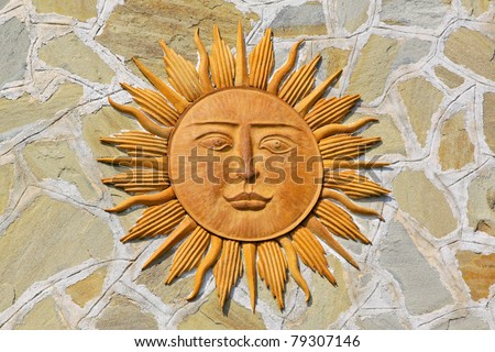 Close up shot of sun with face and rays