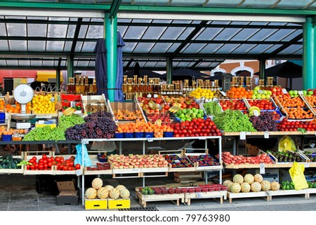 Fresh fruits and vegetables at farmers market stall