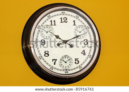 Business clock with different time zone at wall
