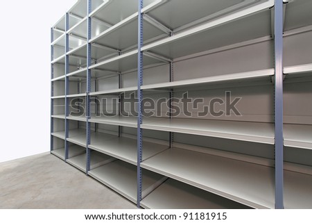 Long empty metal shelf in storage room