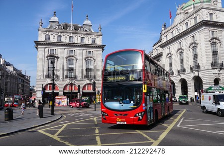 29 July, 2014 - London, England : The big red bus is an iconic image of London, England, and a big tourist attraction.