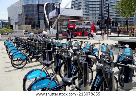 LONDON, ENGLAND  - 27 July 2014 : London\'s bike sharing scheme is extremely popular, with bike depots established all around the central city.