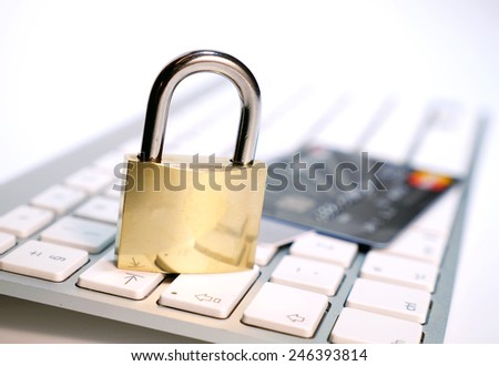 credit card and lock on a keyboard