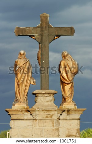 Back view of a large statue (Jesus on a cross).
