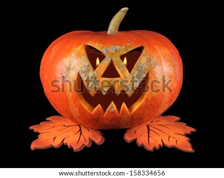 Pumpkin, halloween, old jack-o-lantern on black background with fiery flames in the eyes