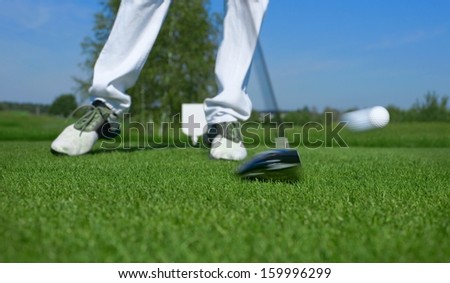 Golf, driver hitting a golf ball