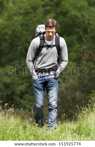 Man Hiking In Countryside