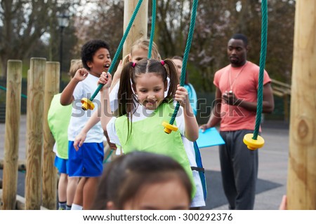 Group Of Children In School Physical Education Class