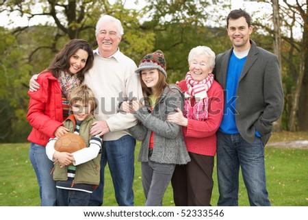 Extended Family Group On Walk Through Countryside