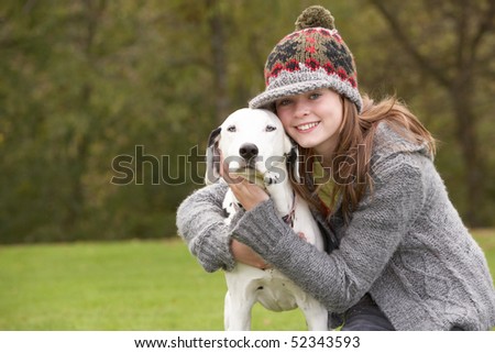 Young Girl Talking Dog For Walk