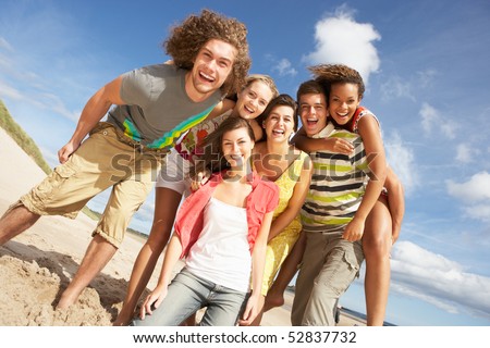 Group Of Friends Having Fun On Summer Beach