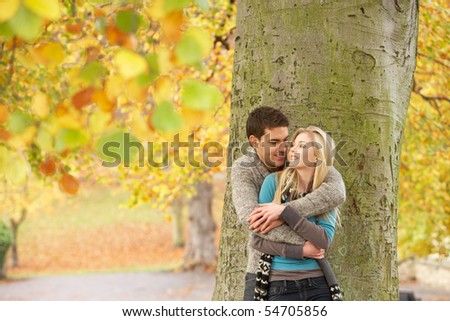 couple by tree