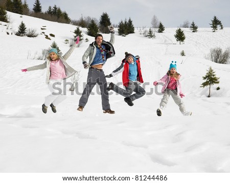 Young Family On Winter Vacation