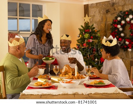 Adult African American family having Christmas dinner