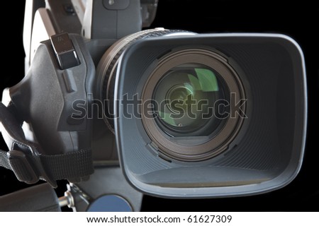 Close up of video camera on a black background