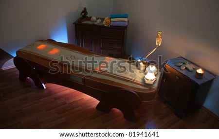 Thermal Massage Bed in a spa with ambient light