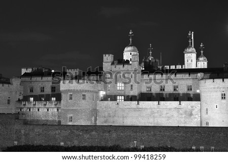 Tower of London castle at night, in black and white. England, United Kingdom.